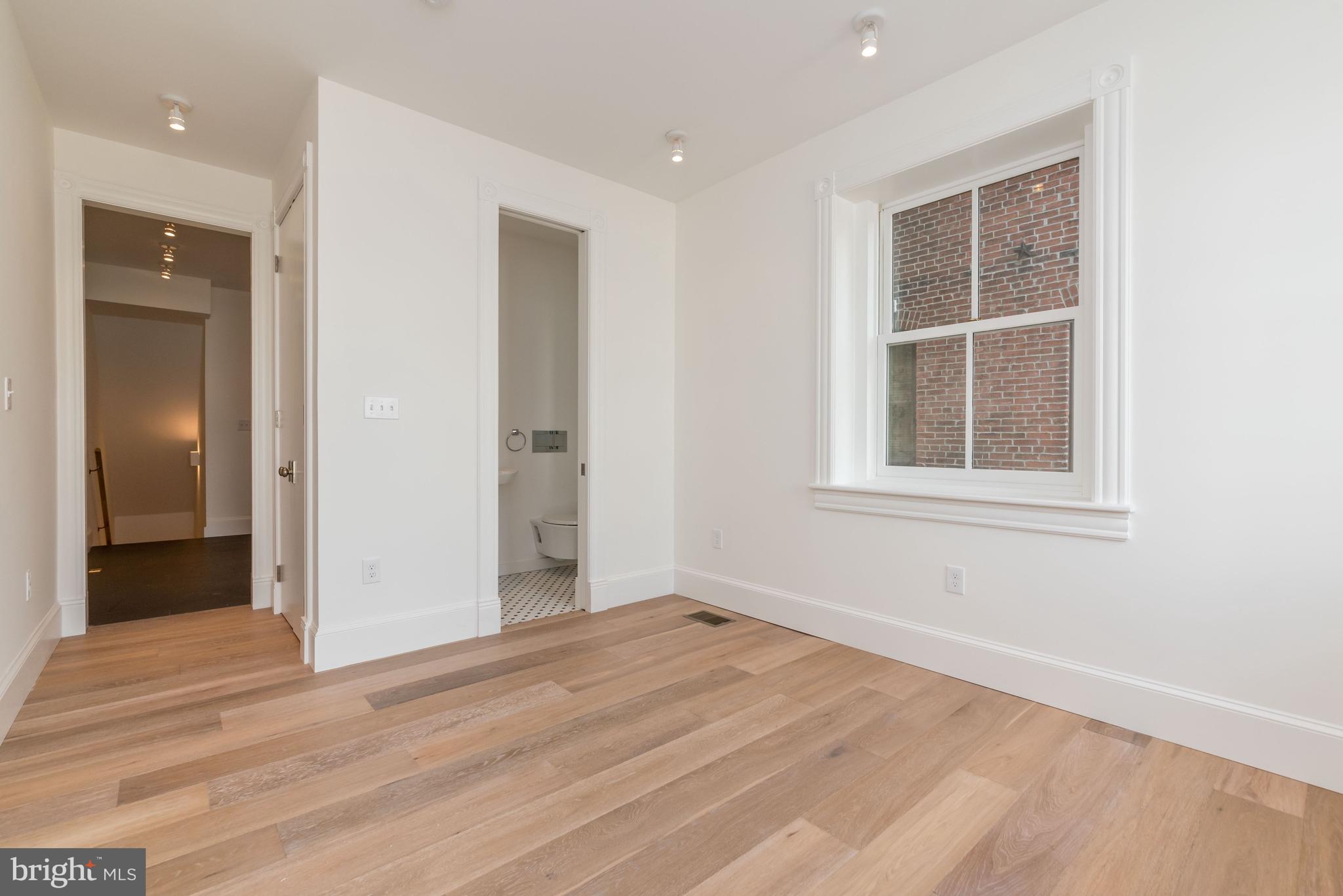 1103 P Street Northwest Washington, DC 20005 - Photo 7 of 28 Bedroom with Half Bathroom