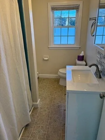 a bathroom with a sink and a vanity