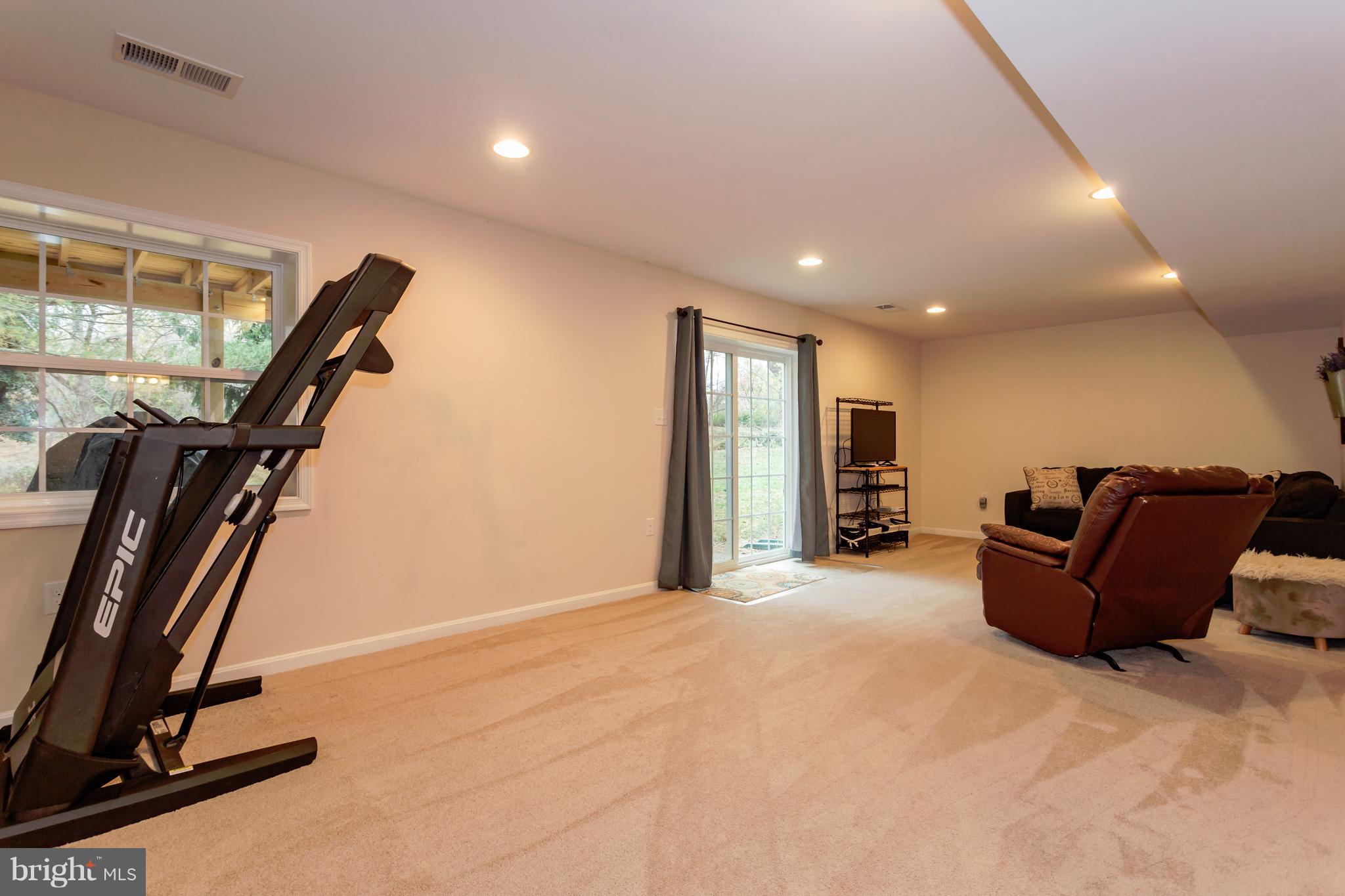 11305 Russell Road Purcellville, VA 20132 - Photo 21 of 29 Lower Level Walk out Rec Room