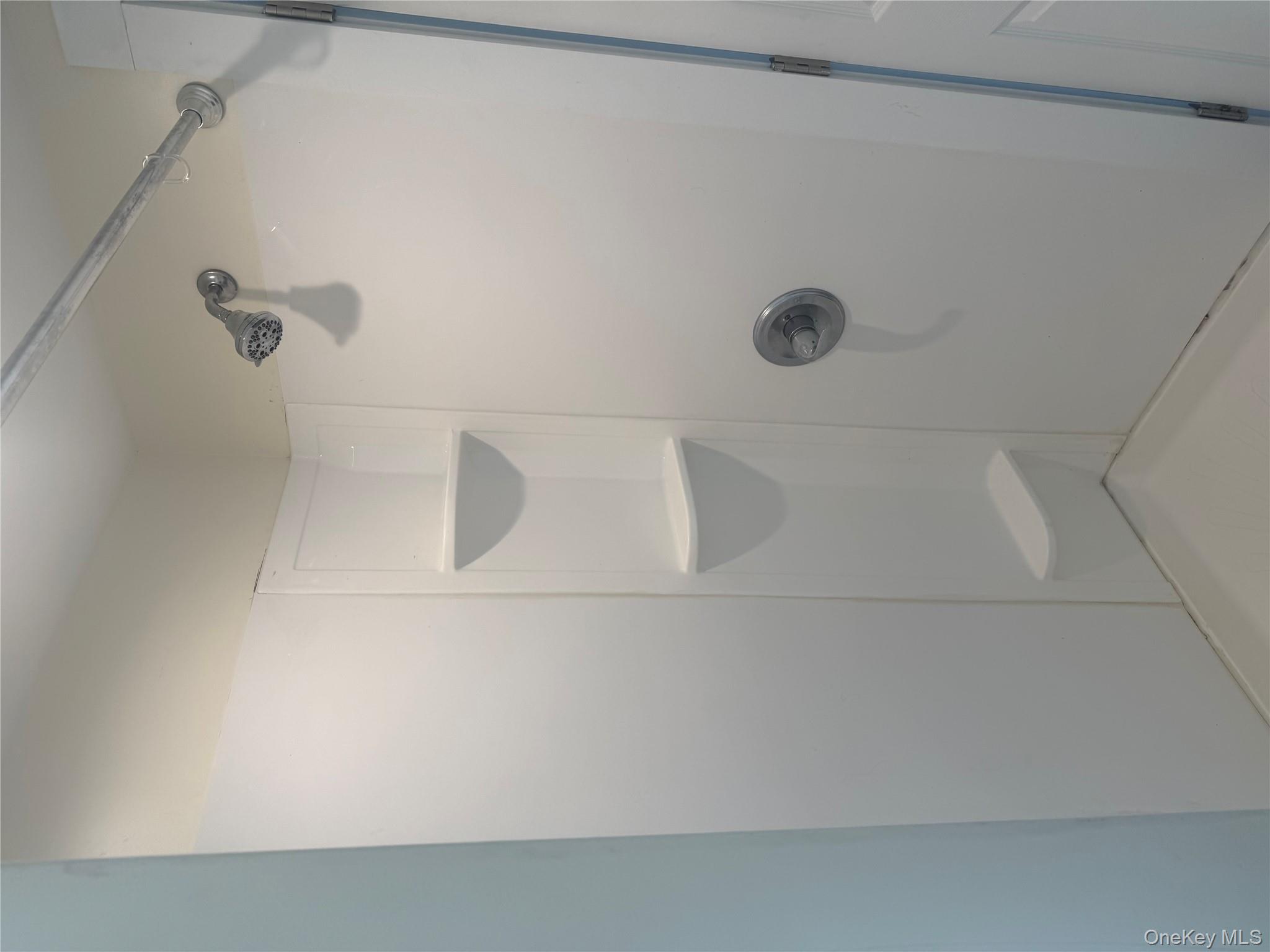 92 Wigsten Road, Unit 1 Pleasant Valley, NY 12569 - Photo 7 of 8 a bathroom with a shower