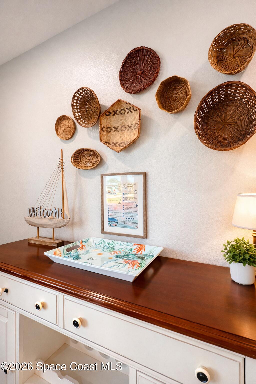 120 Boca Ciega Road Cocoa Beach, FL 32931 - Photo 6 of 23 a bathroom with a sink and a mirror