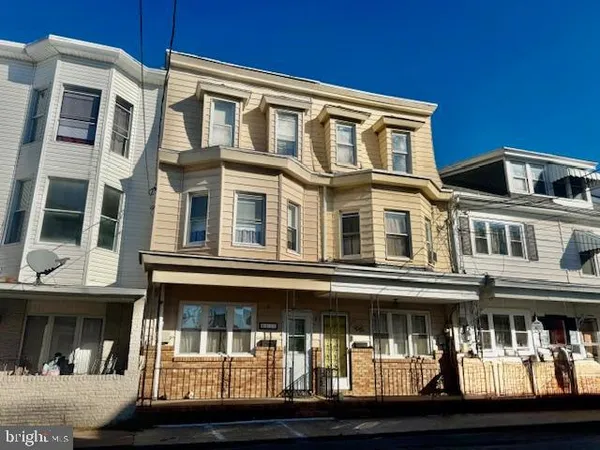 a front view of multi story residential apartment building