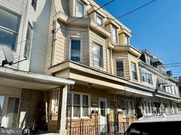 a front view of a building and a entrance
