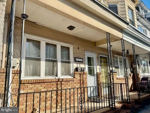 a view of a house with a large window