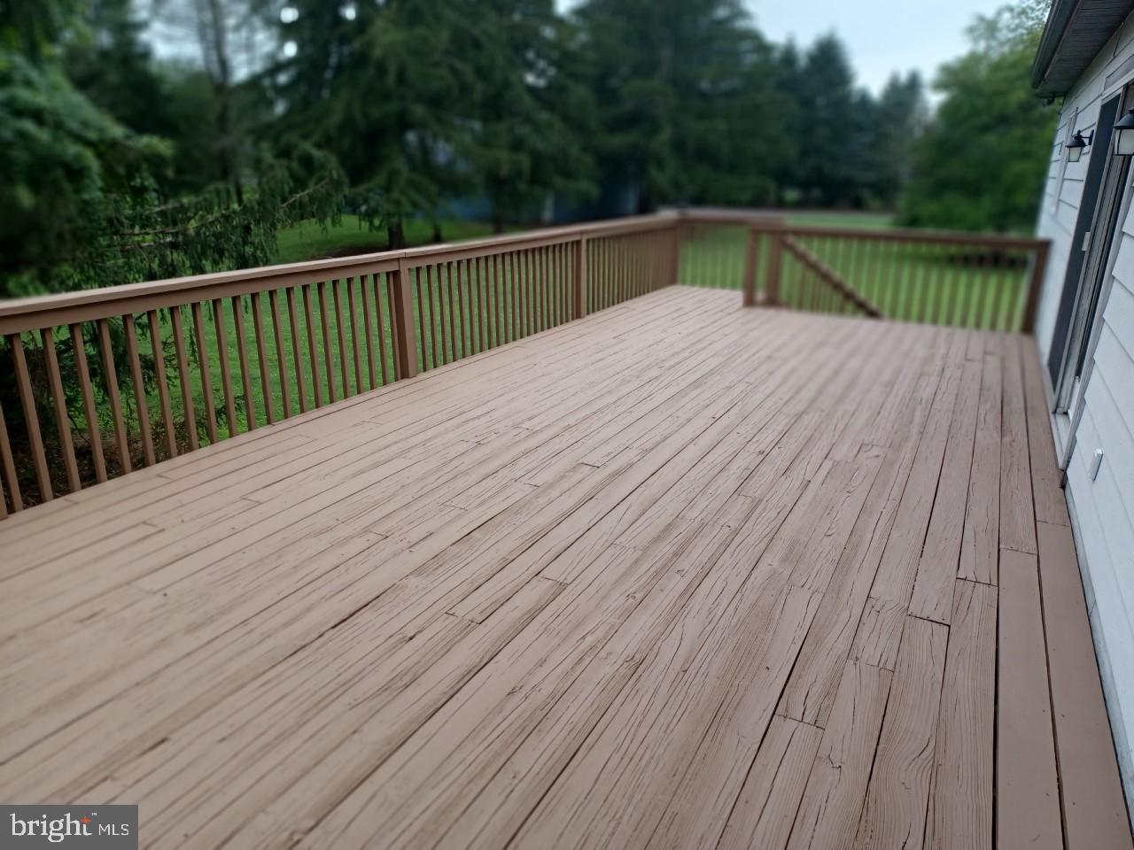 1525 Yardley Newtown Road, Unit 1 Morrisville, PA 19067 - Photo 13 of 14 a view of backyard with a deck