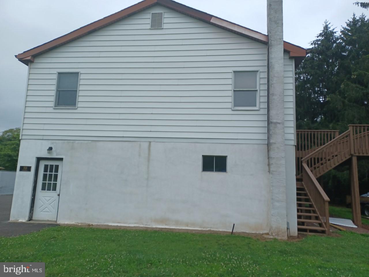 1525 Yardley Newtown Road, Unit 1 Morrisville, PA 19067 - Photo 2 of 14 a view of backyard of house and deck