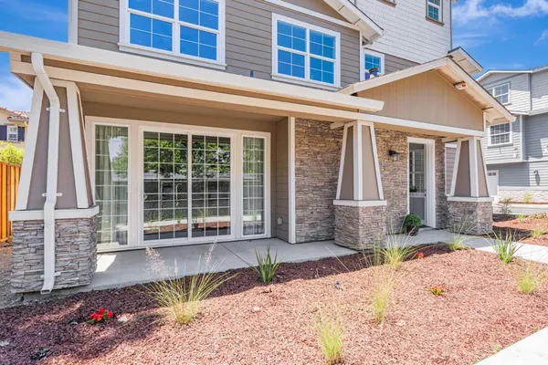 a front view of a house with a patio