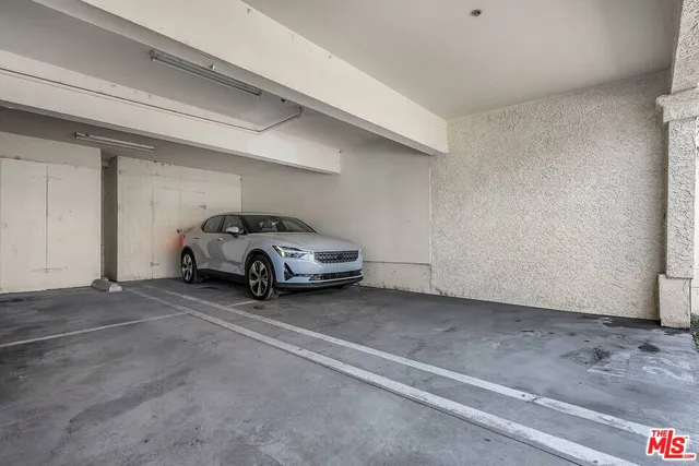 a view of a house with a yard and garden