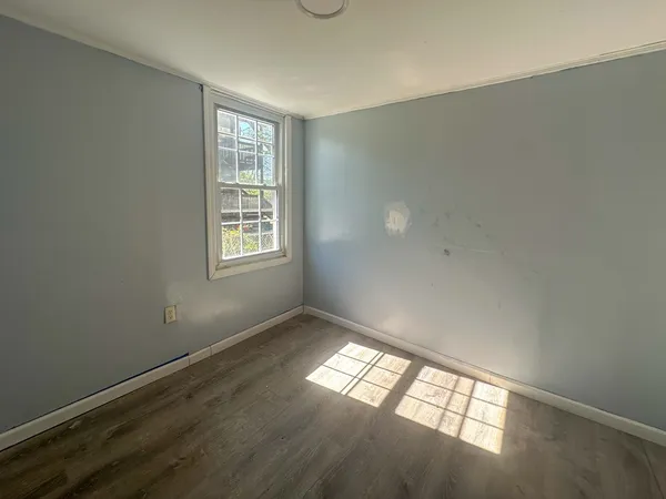 a view of an empty room and window