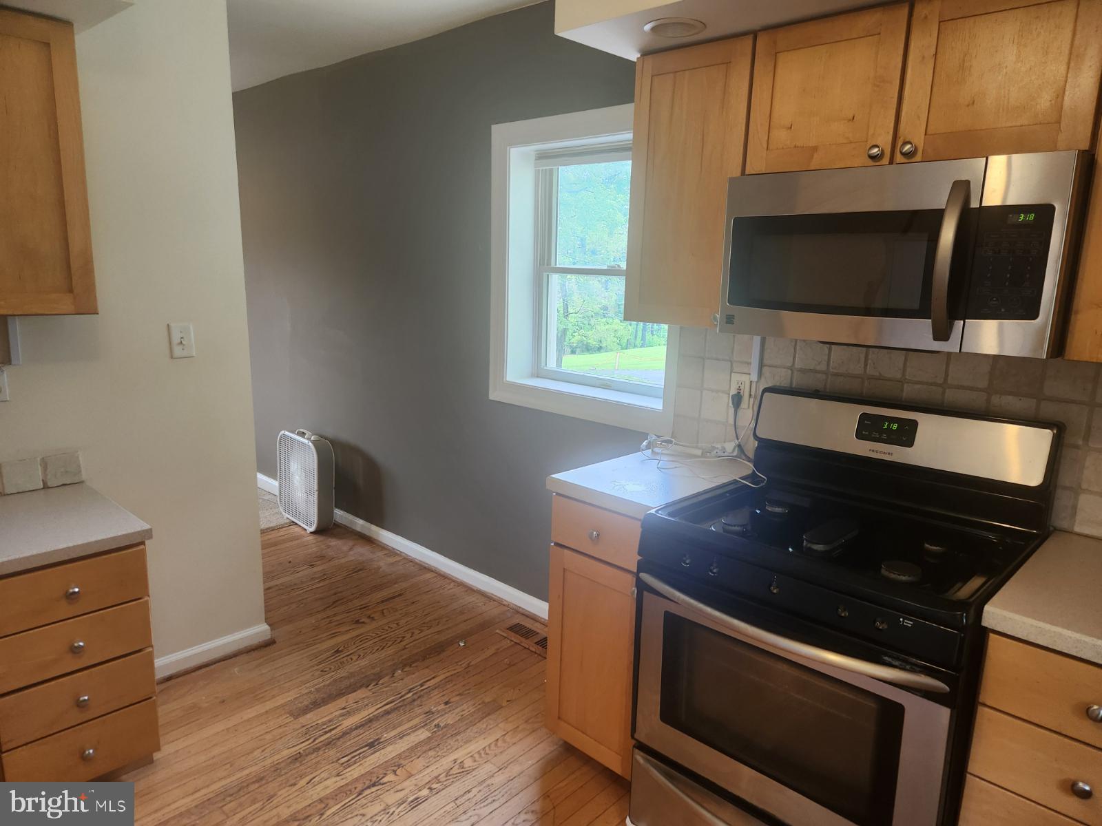 1507 Easton Road Warrington, PA 18976 - Photo 22 of 55 a kitchen with a stove and a microwave