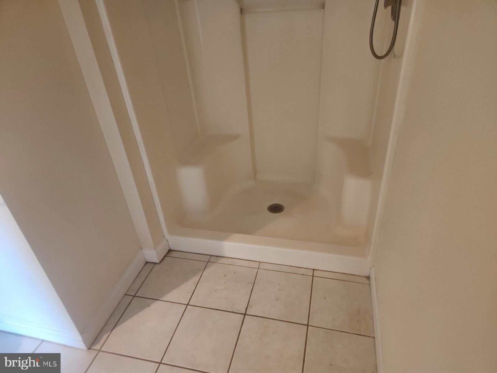 1507 Easton Road Warrington, PA 18976 - Photo 39 of 55 a bathroom with a glass shower door