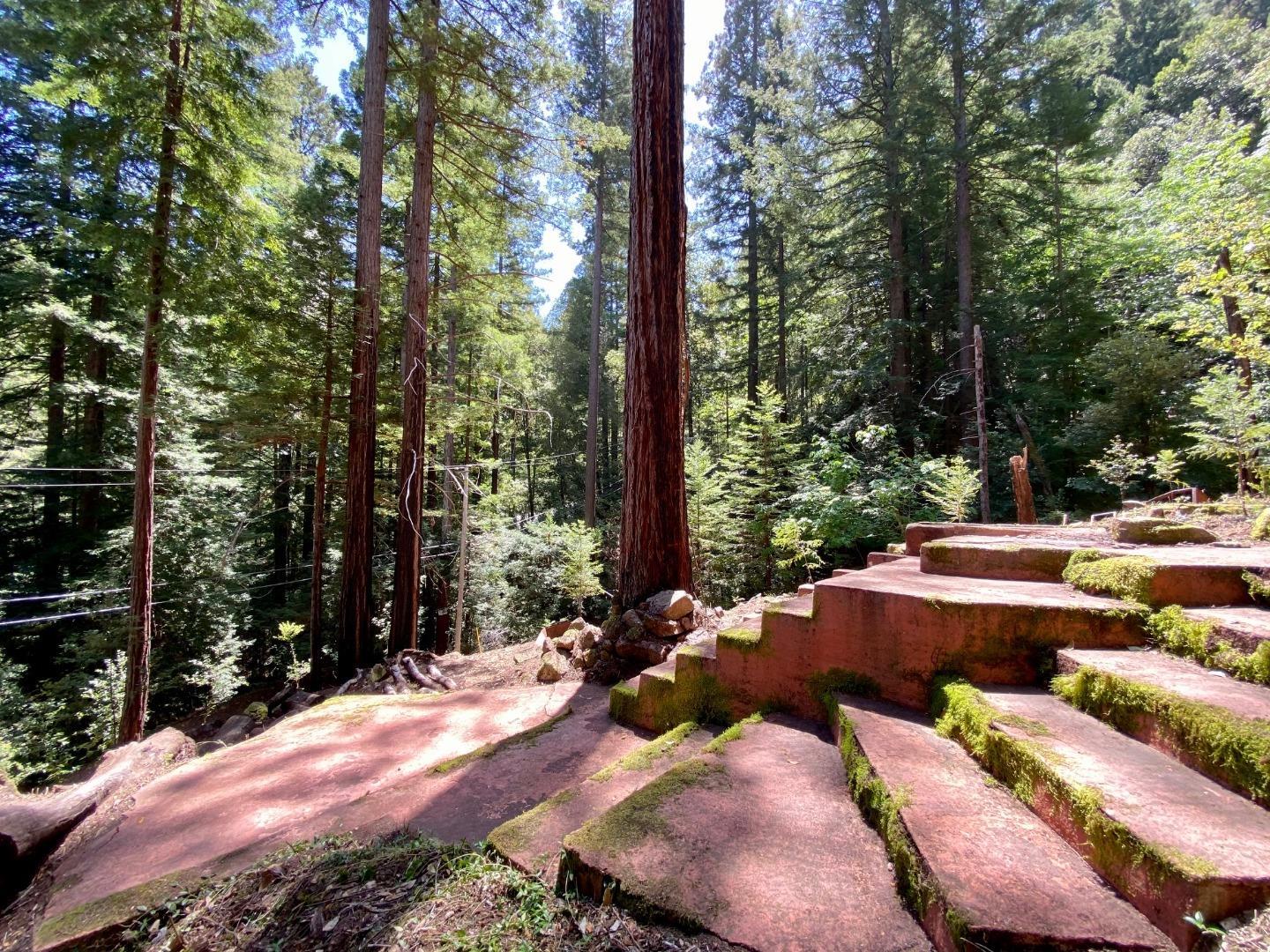 511 Waldeberg Road Ben Lomond, CA 95005 - Photo 8 of 9 a view of a patio with chairs and a fire pit