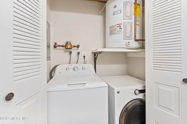 an aerial view of house with yard