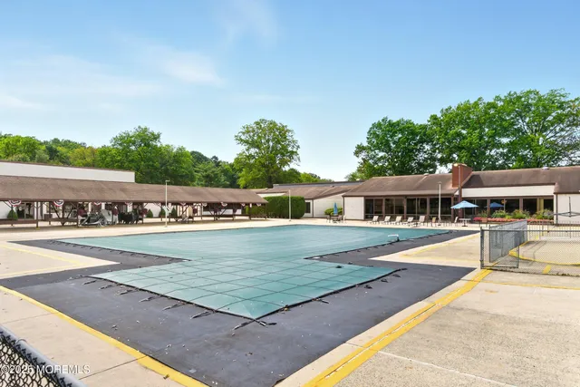 a view of big yard with a big yard and large trees