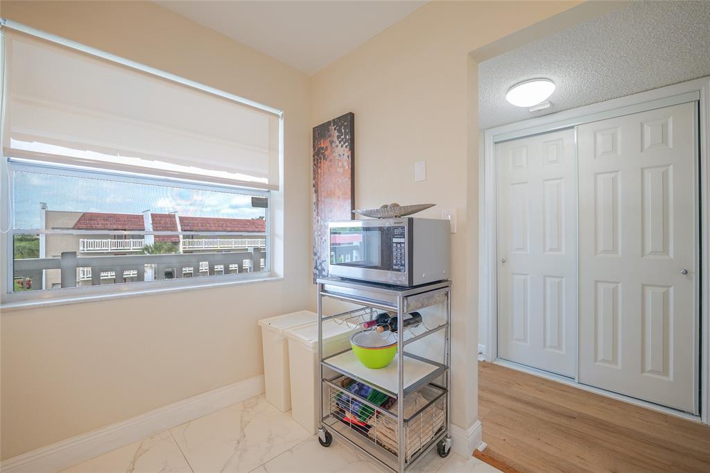 3531 Inverrary Drive, Unit 407 Lauderhill, FL 33319 - Photo 13 of 59 a room with furniture and a window