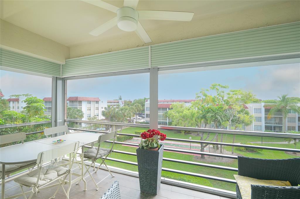 3531 Inverrary Drive, Unit 407 Lauderhill, FL 33319 - Photo 3 of 59 a view of a city from a balcony