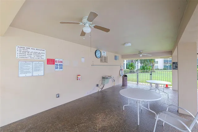 a room with lots of wooden furniture and a table