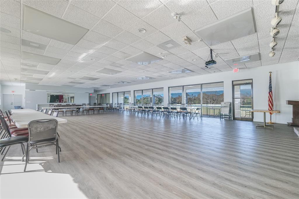 3531 Inverrary Drive, Unit 407 Lauderhill, FL 33319 - Photo 42 of 59 a room with lots of wooden furniture and a table