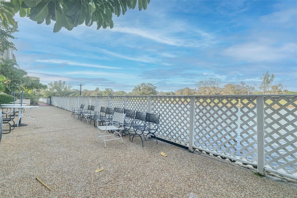 3531 Inverrary Drive, Unit 407 Lauderhill, FL 33319 - Photo 51 of 59 a view of a terrace with lake view