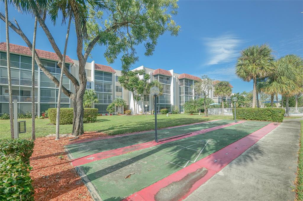 3531 Inverrary Drive, Unit 407 Lauderhill, FL 33319 - Photo 55 of 59 a view of a park with large trees