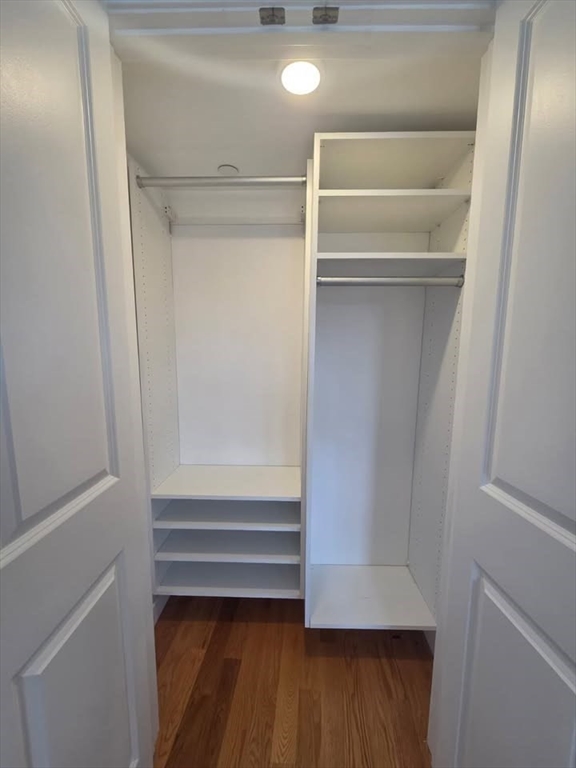 64 Market Street, Unit 303 Lynn, MA 01901 - Photo 9 of 12 a view of walk in closet with empty racks