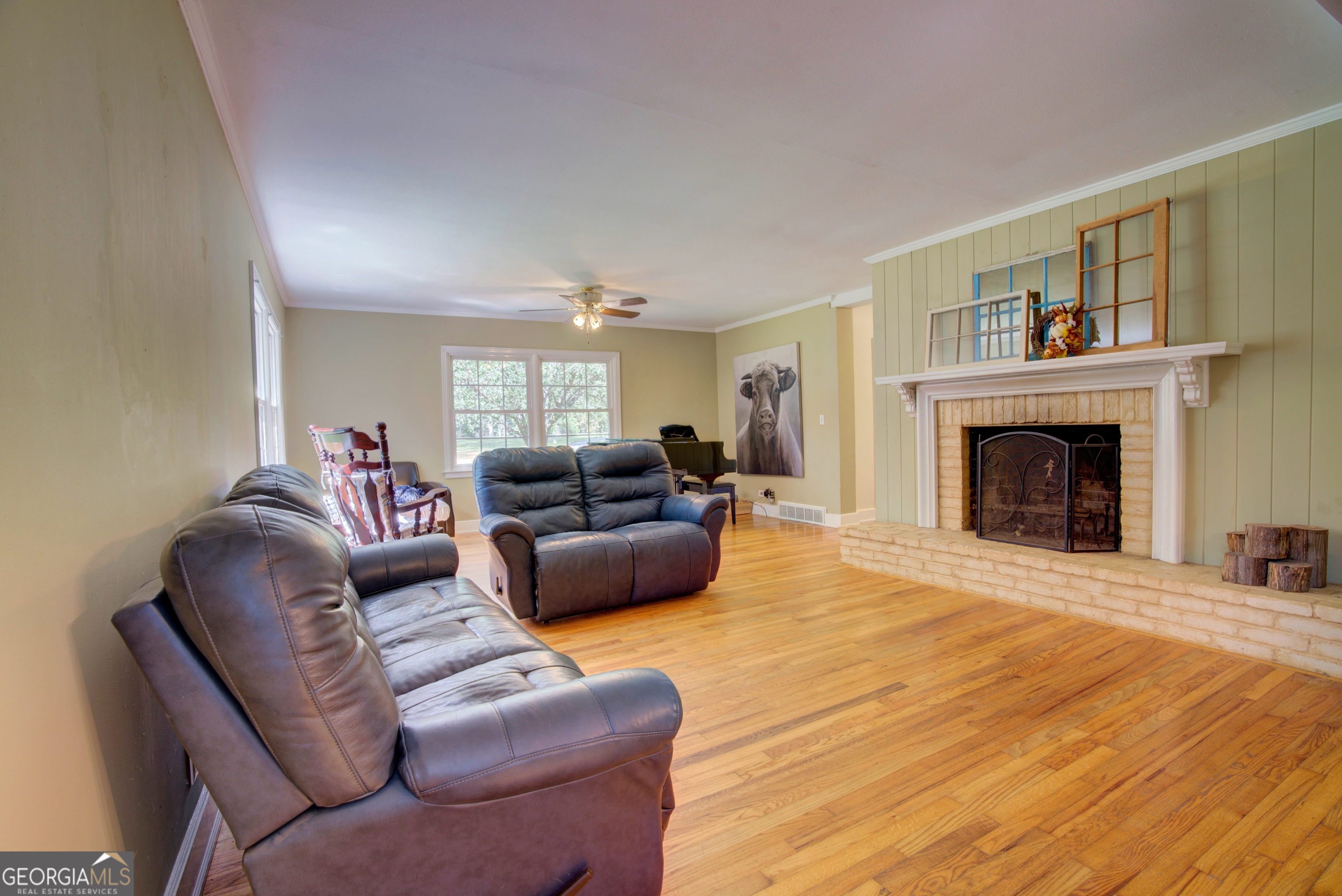 521 West John Hand Road Cedartown, GA 30125 - Photo 14 of 43 a living room with furniture fireplace and a window