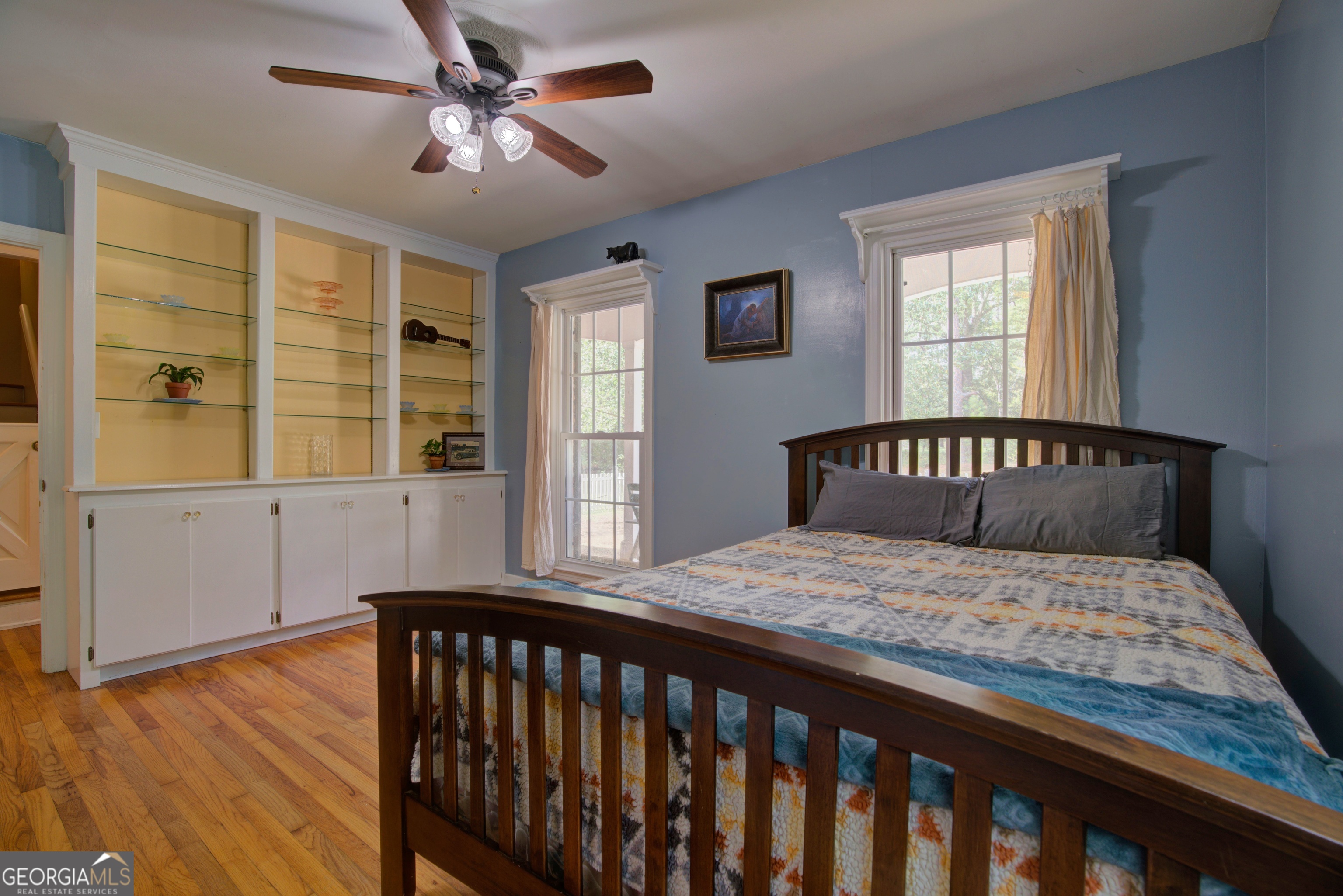 521 West John Hand Road Cedartown, GA 30125 - Photo 29 of 43 a bedroom with a bed and wooden floor