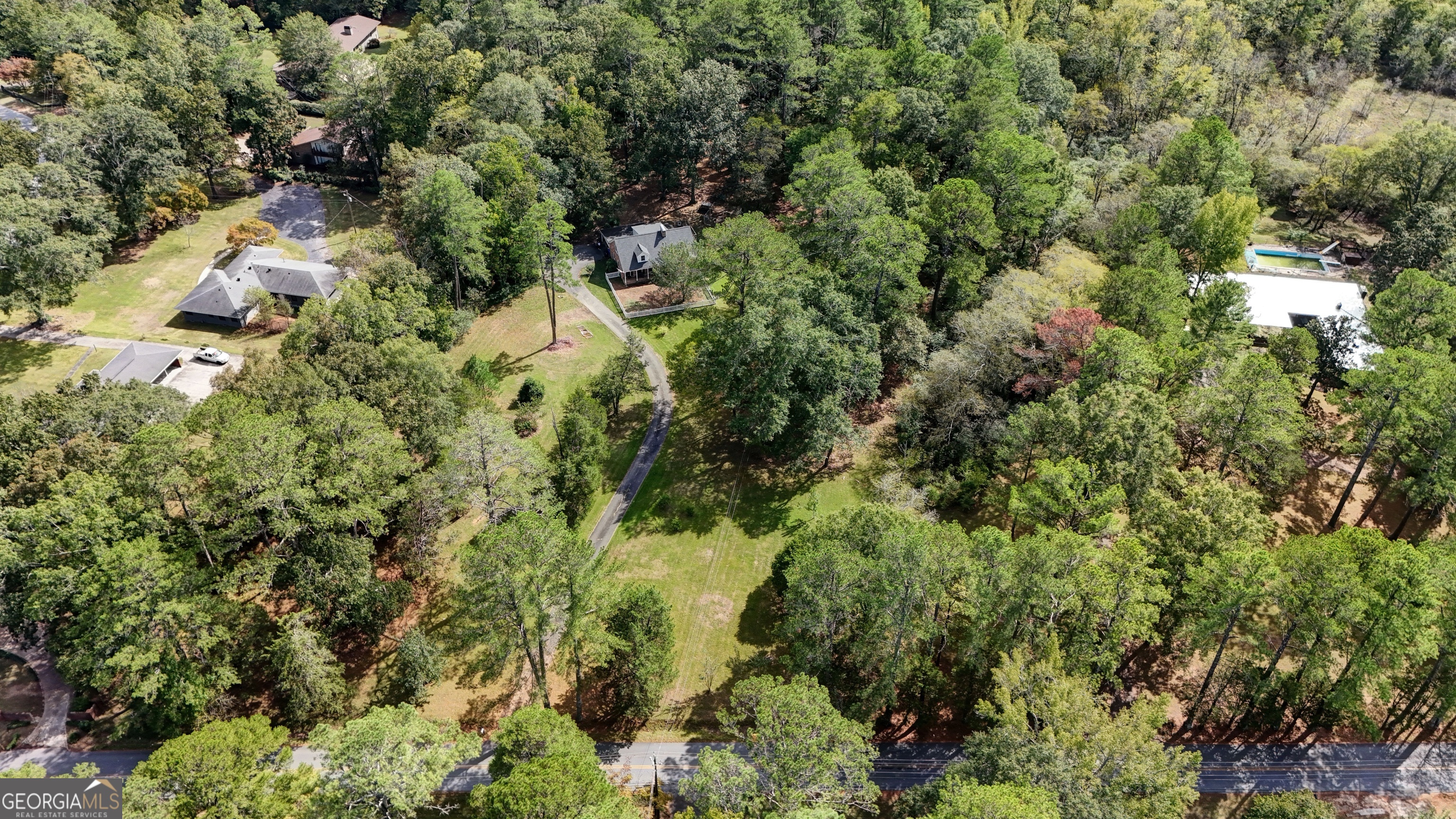521 West John Hand Road Cedartown, GA 30125 - Photo 40 of 43 an aerial view of residential house with outdoor space and trees all around