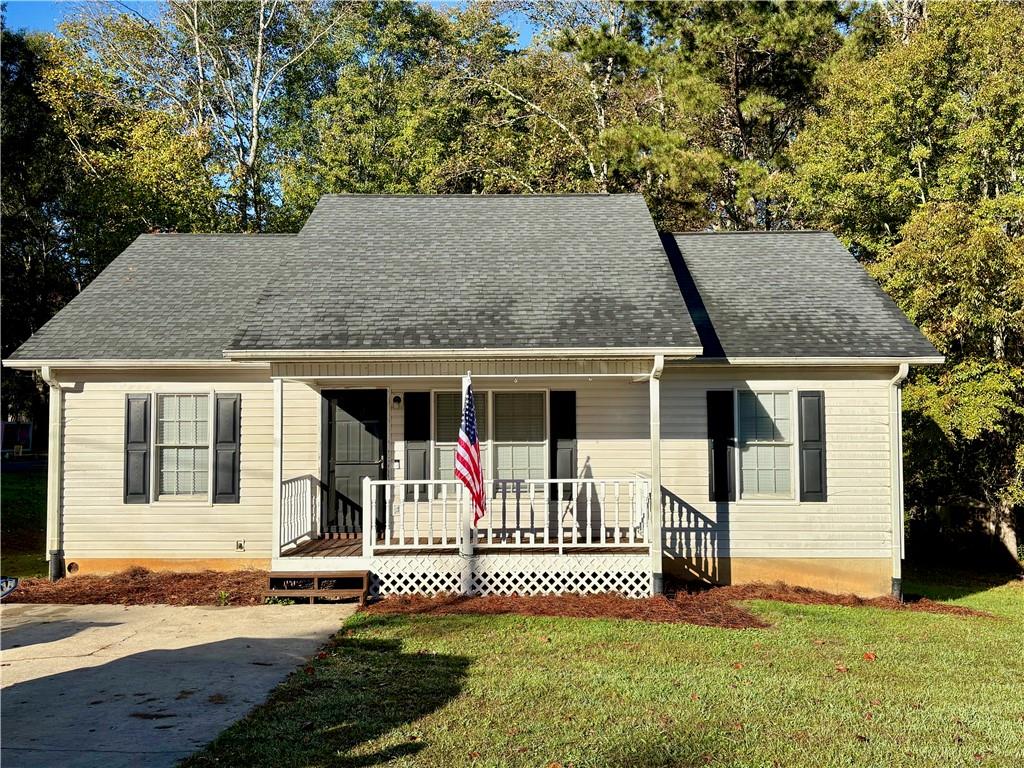 208 Maple Street Dawsonville, GA 30534 - Photo 1 of 1 front view of a house with a yard