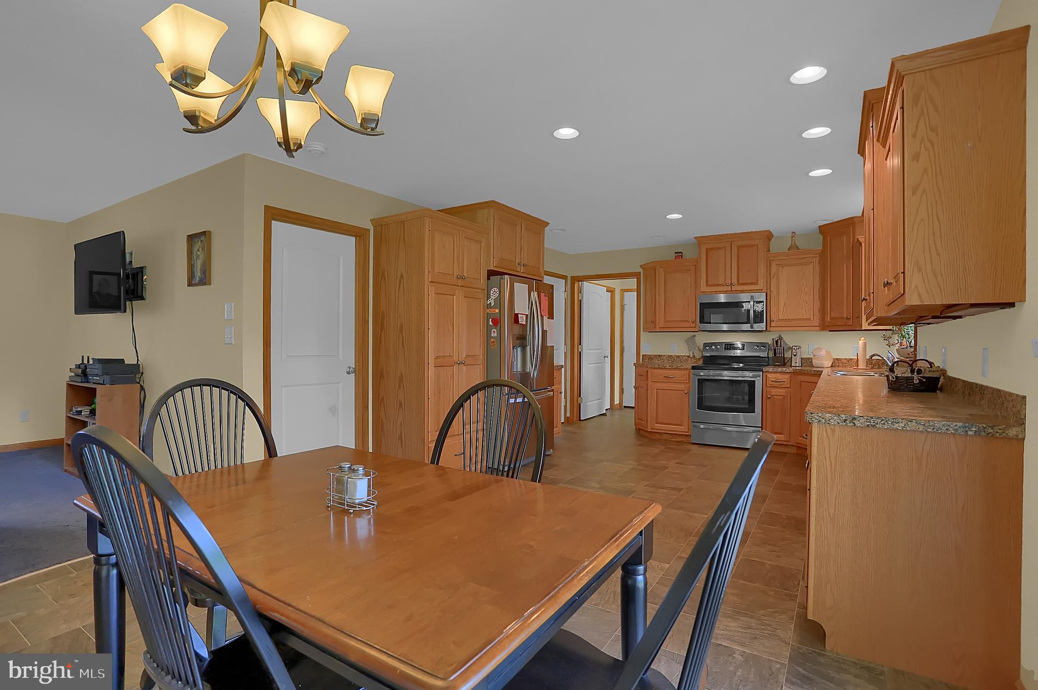 8986 Roxbury Road Orrstown, PA 17244 - Photo 12 of 44 Dining room open to Kitchen and Living rooms