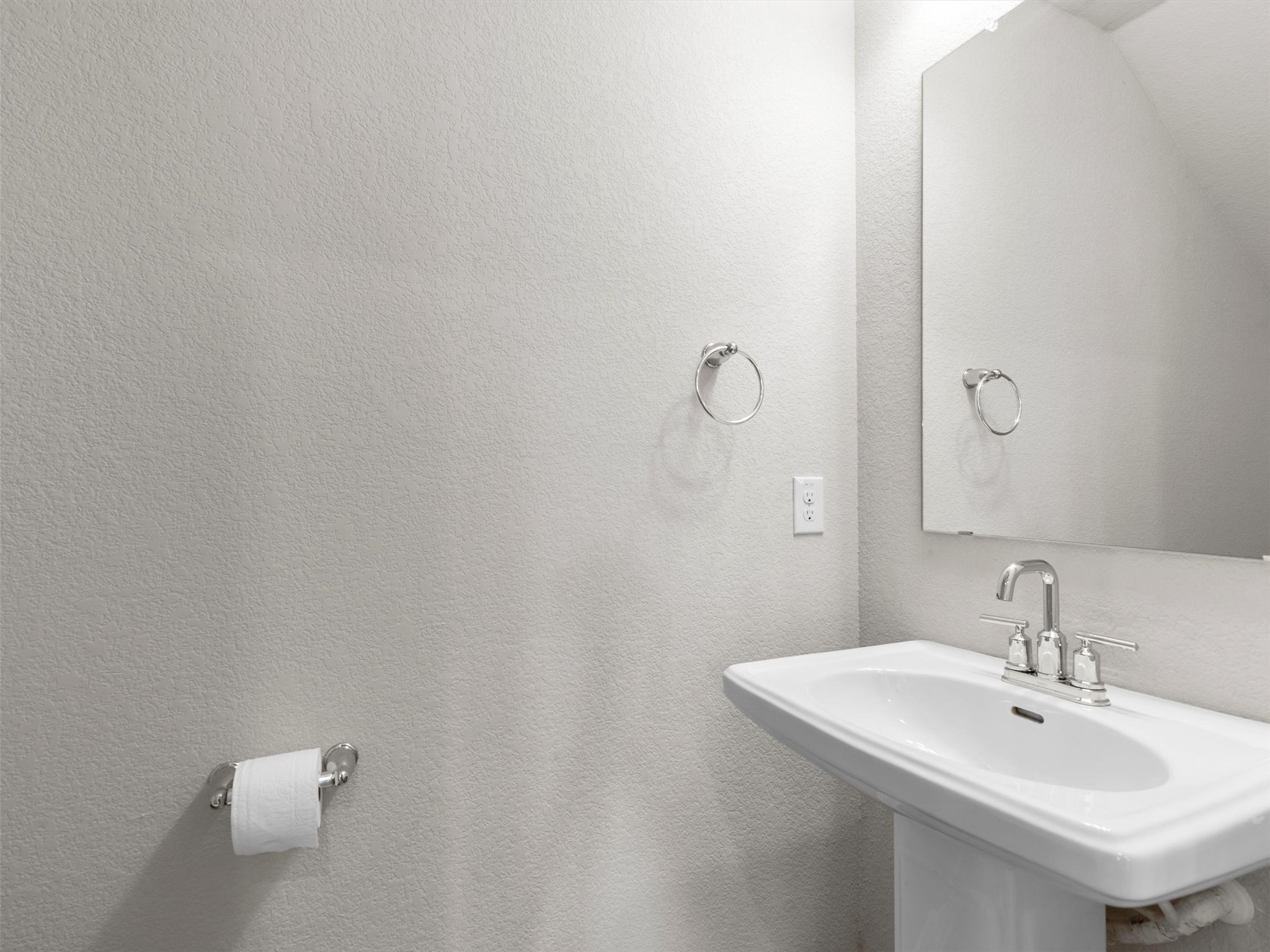 9015 Cattle Baron Path, Unit 2001 Austin, TX 78747 - Photo 13 of 32 a bathroom with a sink and mirror