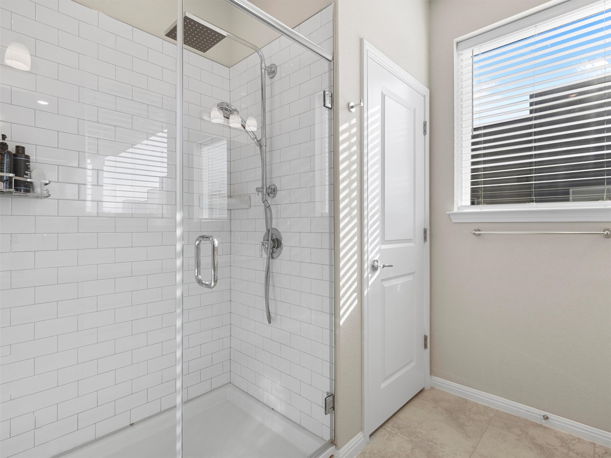 9015 Cattle Baron Path, Unit 2001 Austin, TX 78747 - Photo 17 of 32 a bathroom with a shower