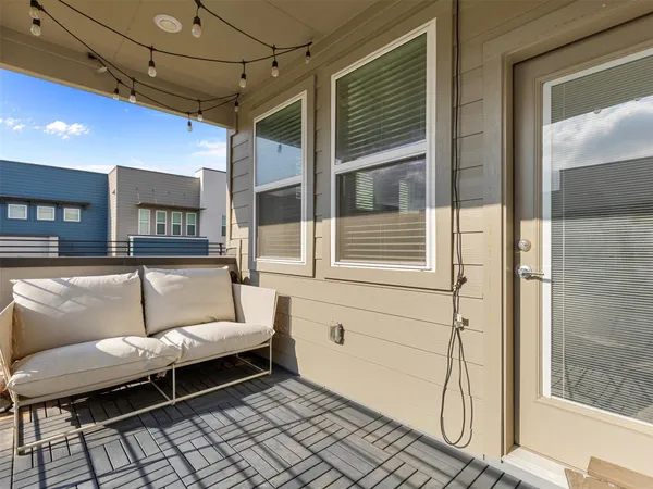 a view of a terrace with sitting area