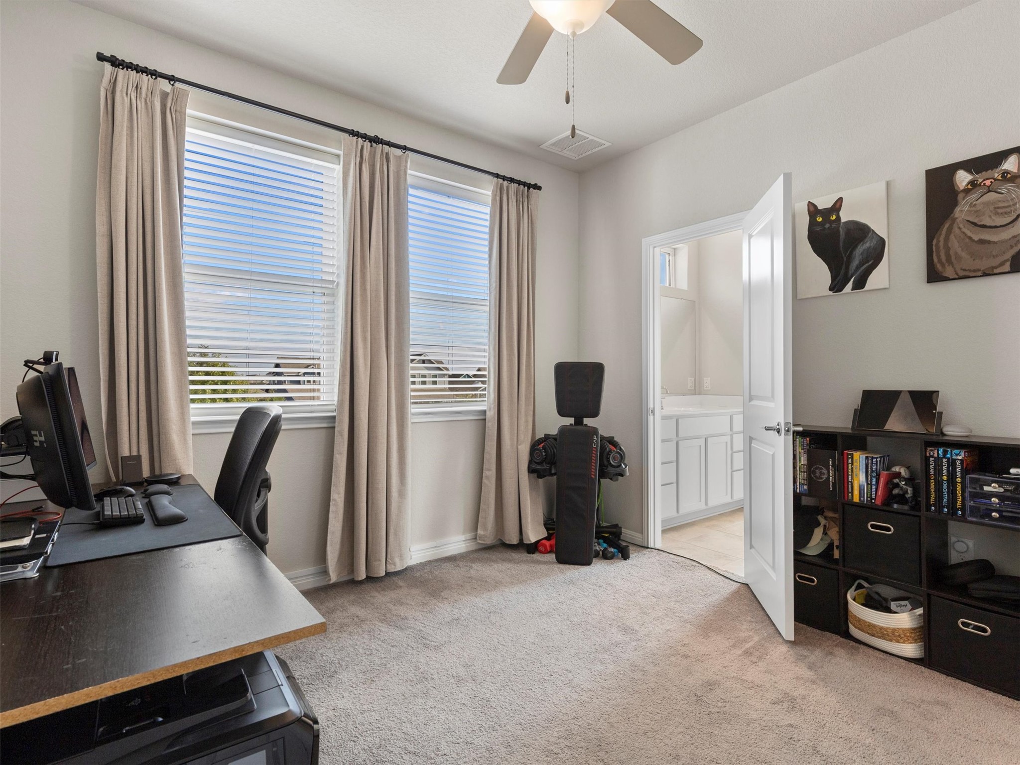9015 Cattle Baron Path, Unit 2001 Austin, TX 78747 - Photo 22 of 32 a view of a workspace with furniture and a window