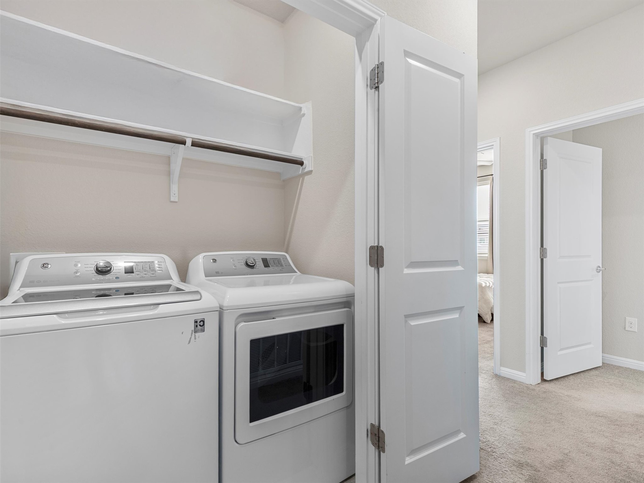9015 Cattle Baron Path, Unit 2001 Austin, TX 78747 - Photo 25 of 32 a utility room with dryer and washer