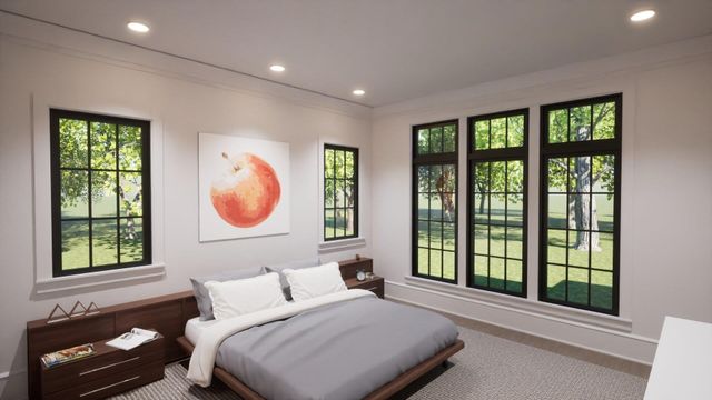 a bedroom with a bed and a large window