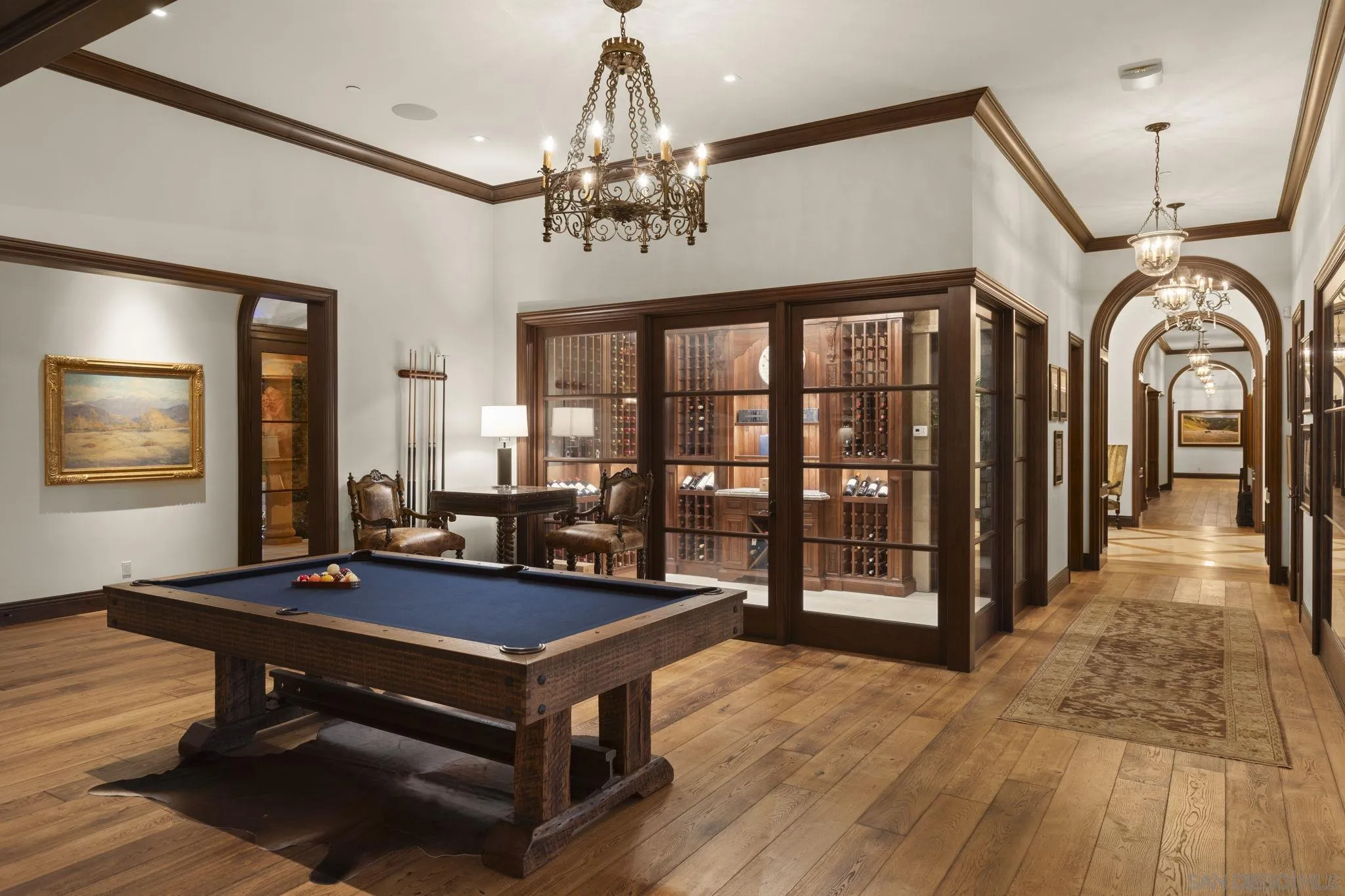 17872 Via De Fortuna Rancho Santa Fe, CA 92067 - Photo 28 of 53 a living room with furniture pool table and a chandelier