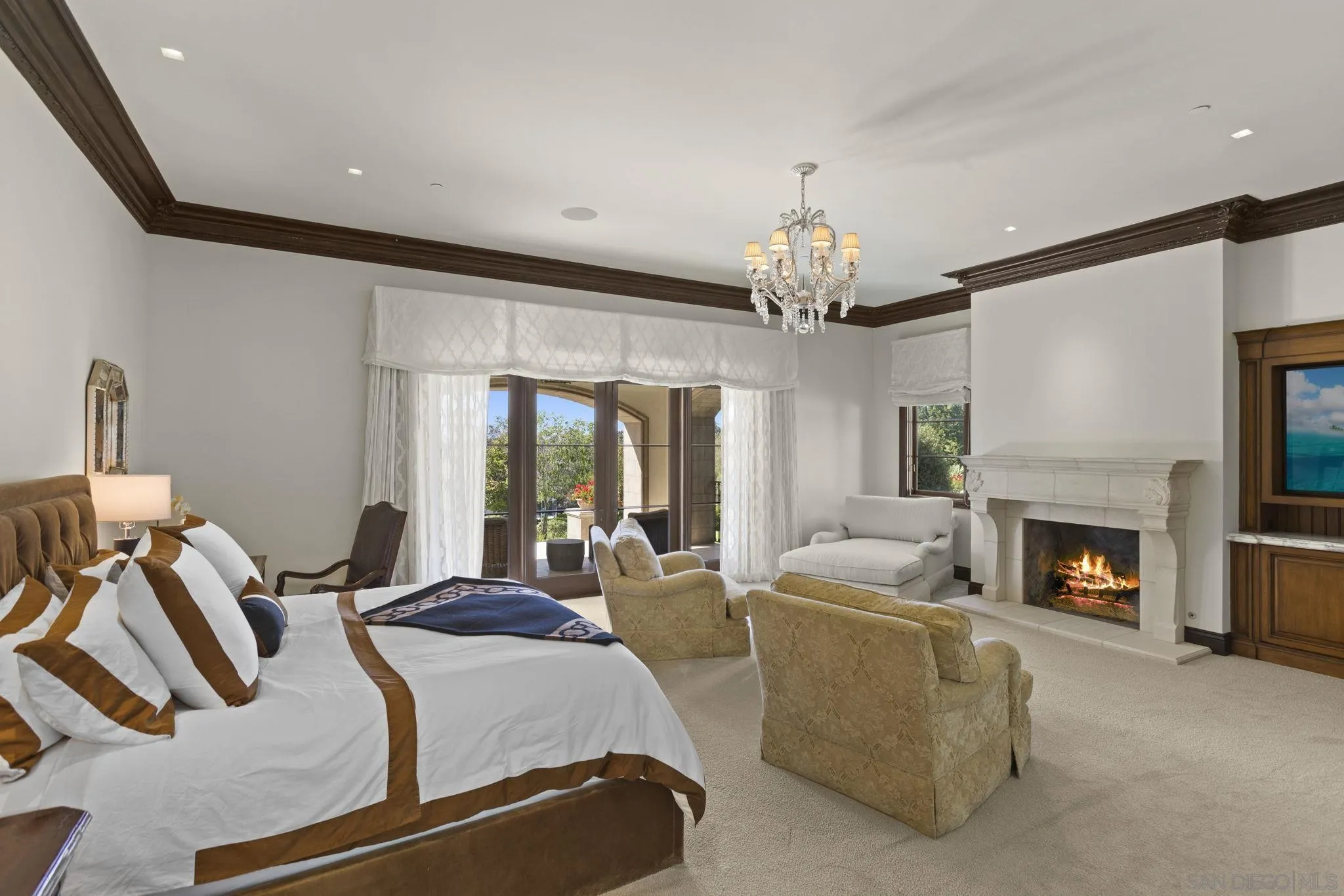 17872 Via De Fortuna Rancho Santa Fe, CA 92067 - Photo 29 of 53 a living room with furniture and a fireplace