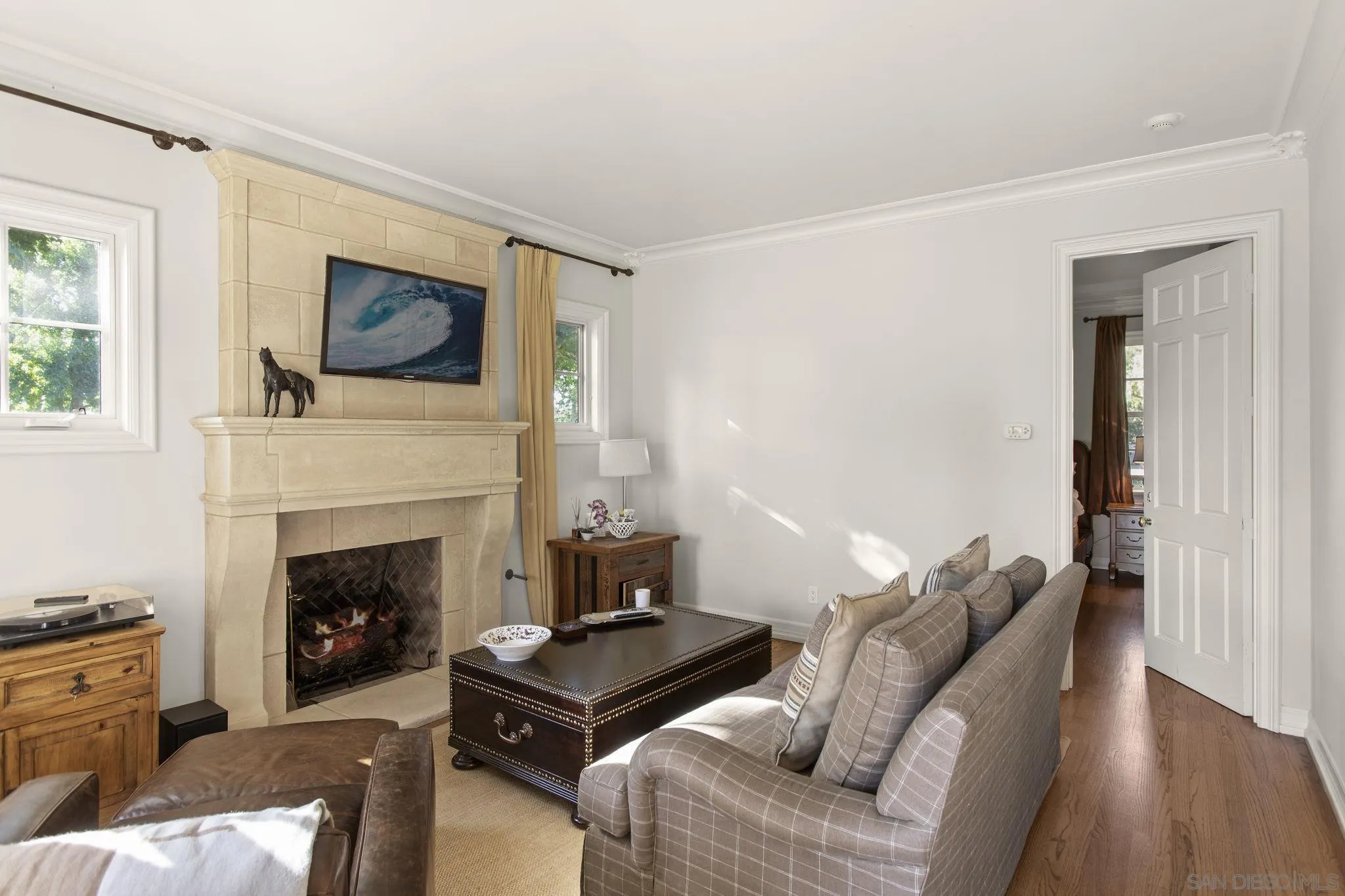 17872 Via De Fortuna Rancho Santa Fe, CA 92067 - Photo 44 of 53 a living room with furniture and a fireplace