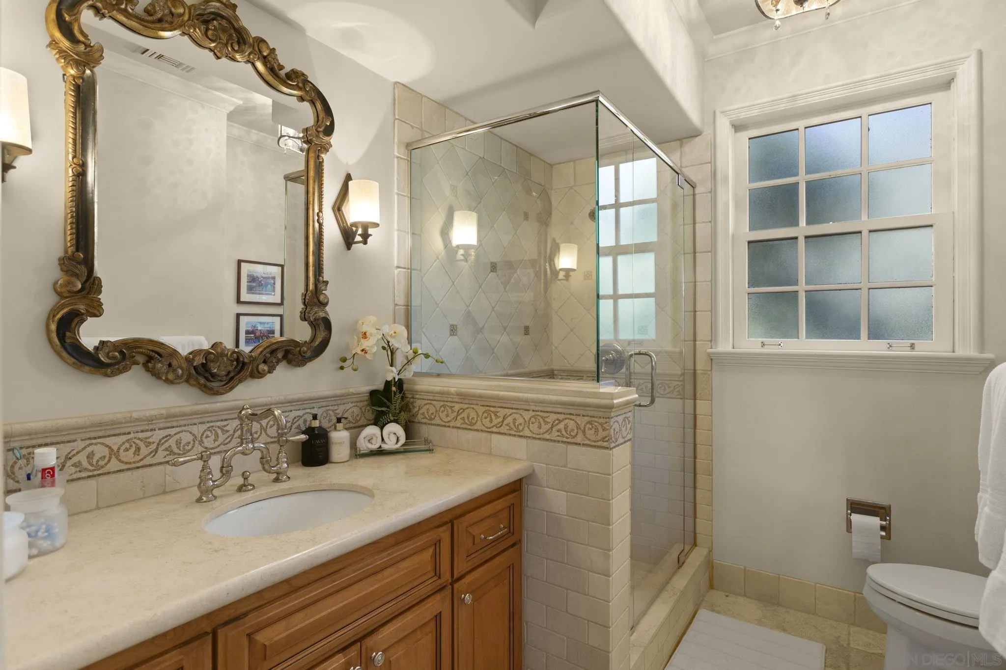 17872 Via De Fortuna Rancho Santa Fe, CA 92067 - Photo 47 of 53 a bathroom with a granite countertop sink mirror and double
