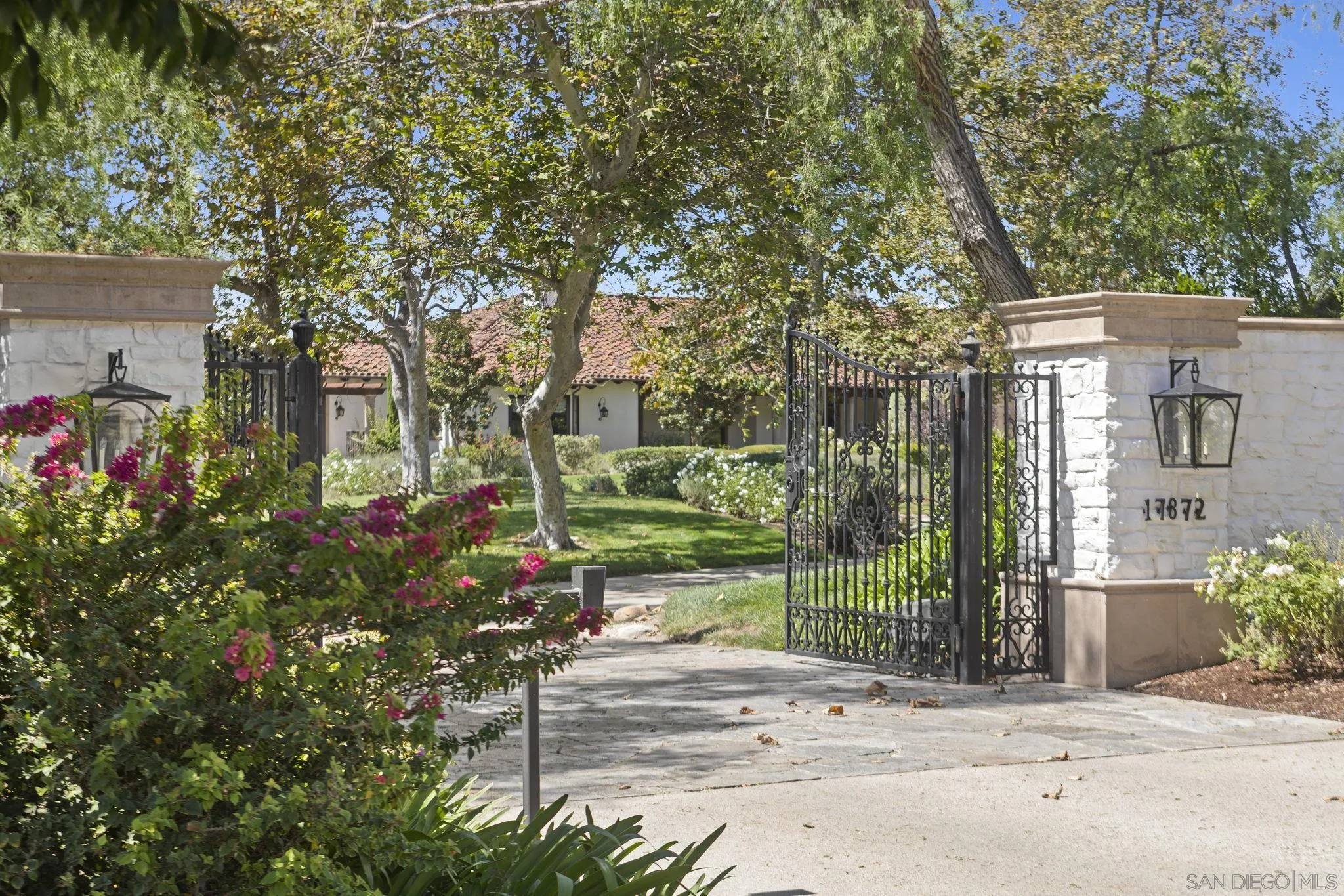 17872 Via De Fortuna Rancho Santa Fe, CA 92067 - Photo 53 of 53 front view of a house with a tree