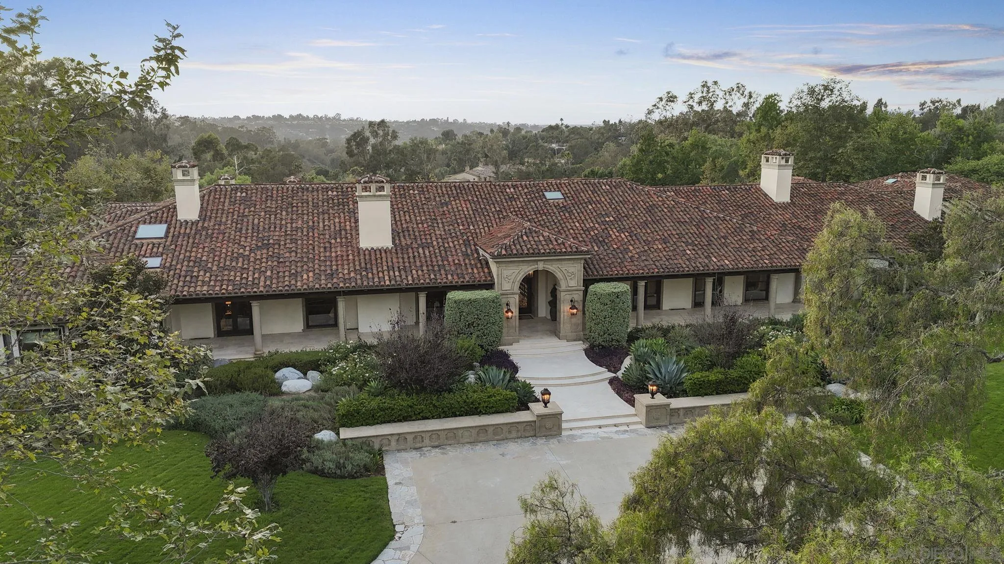 17872 Via De Fortuna Rancho Santa Fe, CA 92067 - Photo 8 of 53 an aerial view of a house with a yard and garage