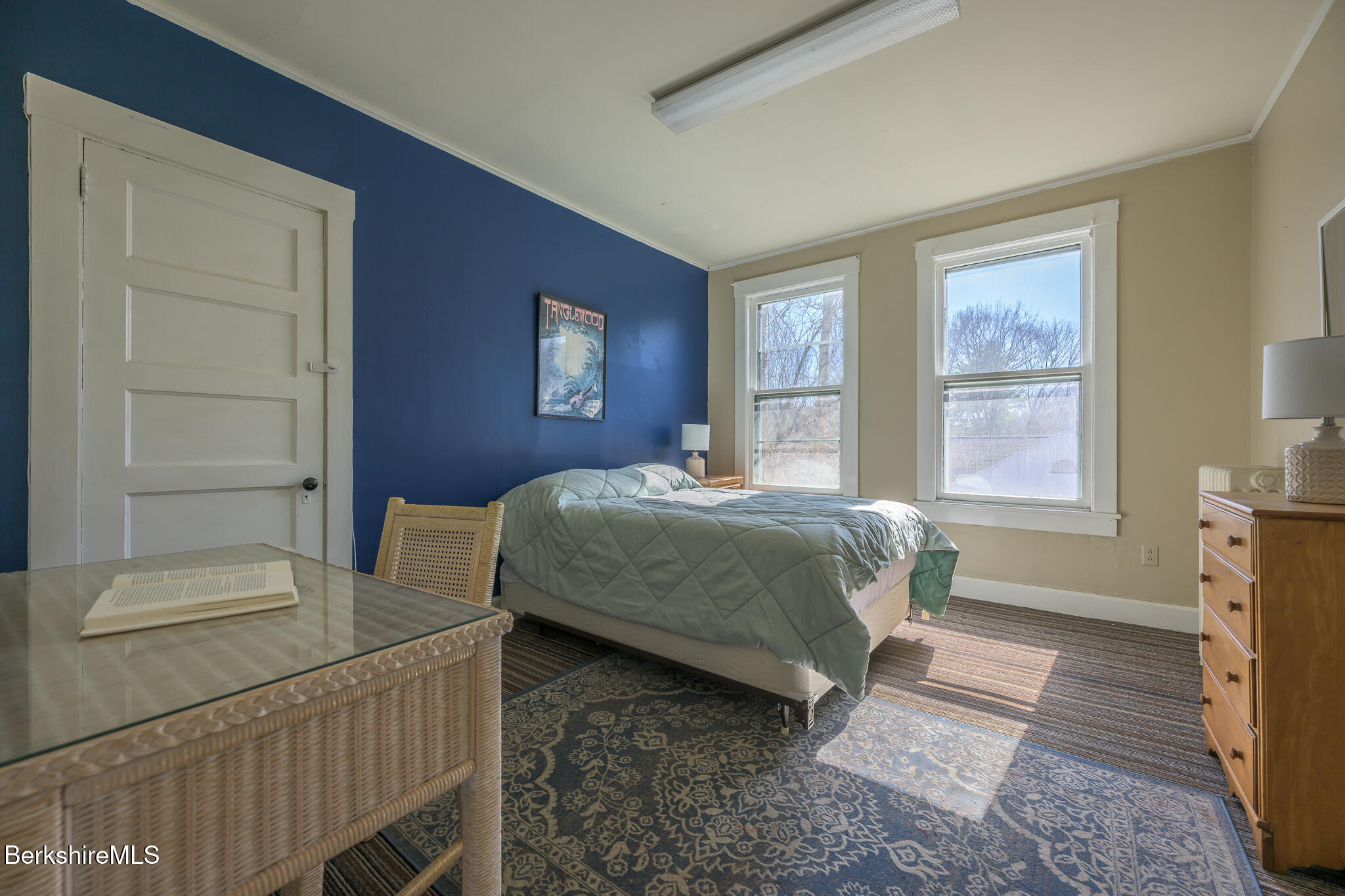 6 East Street Stockbridge, MA 01262 - Photo 18 of 23 a bedroom with a bed and wooden floor