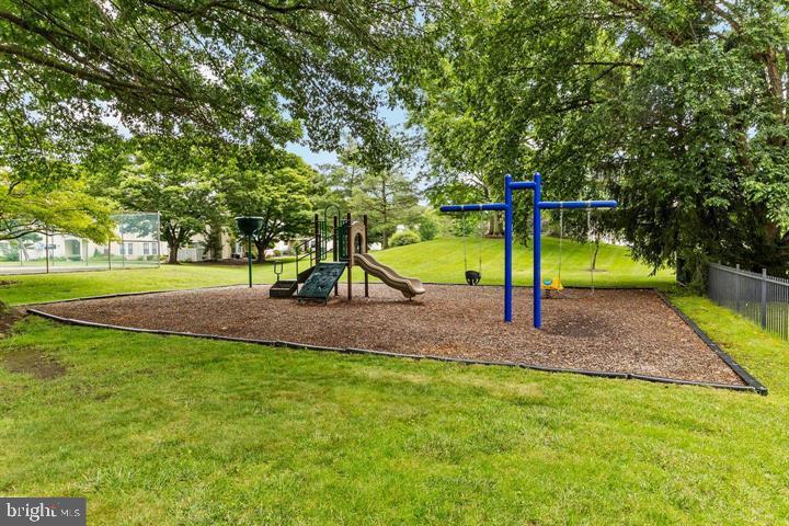 23 Powell Court Hightstown, NJ 08520 - Photo 27 of 31 a view of a park with swings