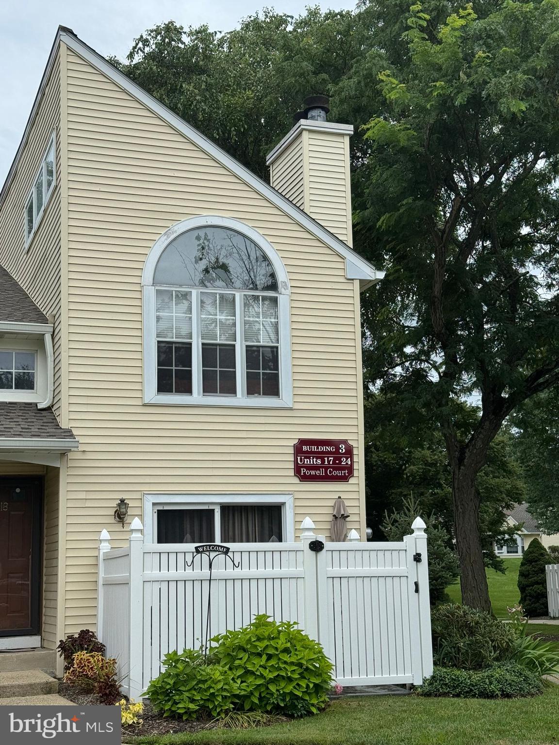 23 Powell Court Hightstown, NJ 08520 - Photo 3 of 31 a view of a house with a yard