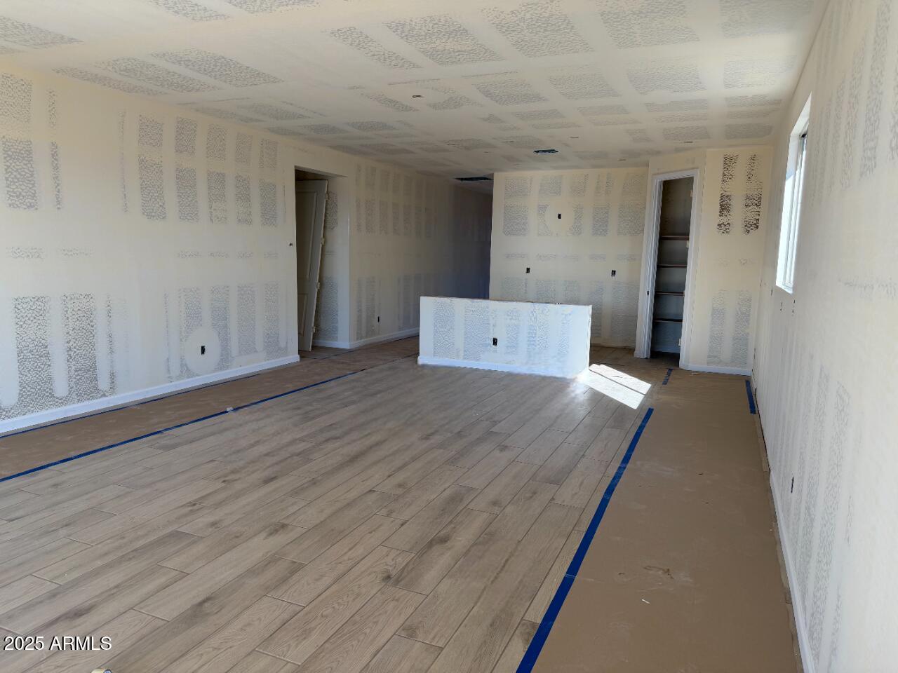 5609 West Hopi Trail Laveen, AZ 85339 - Photo 9 of 29 a view of a room with wooden floor