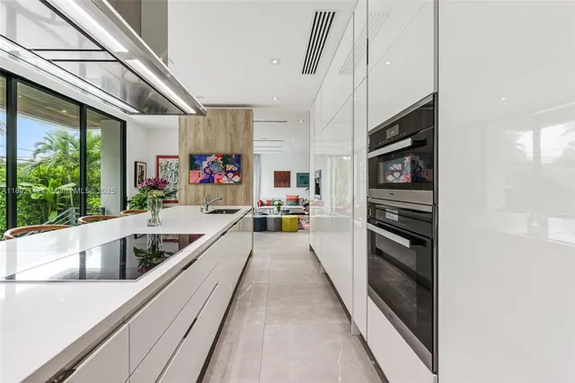 a view of a living room with a large window