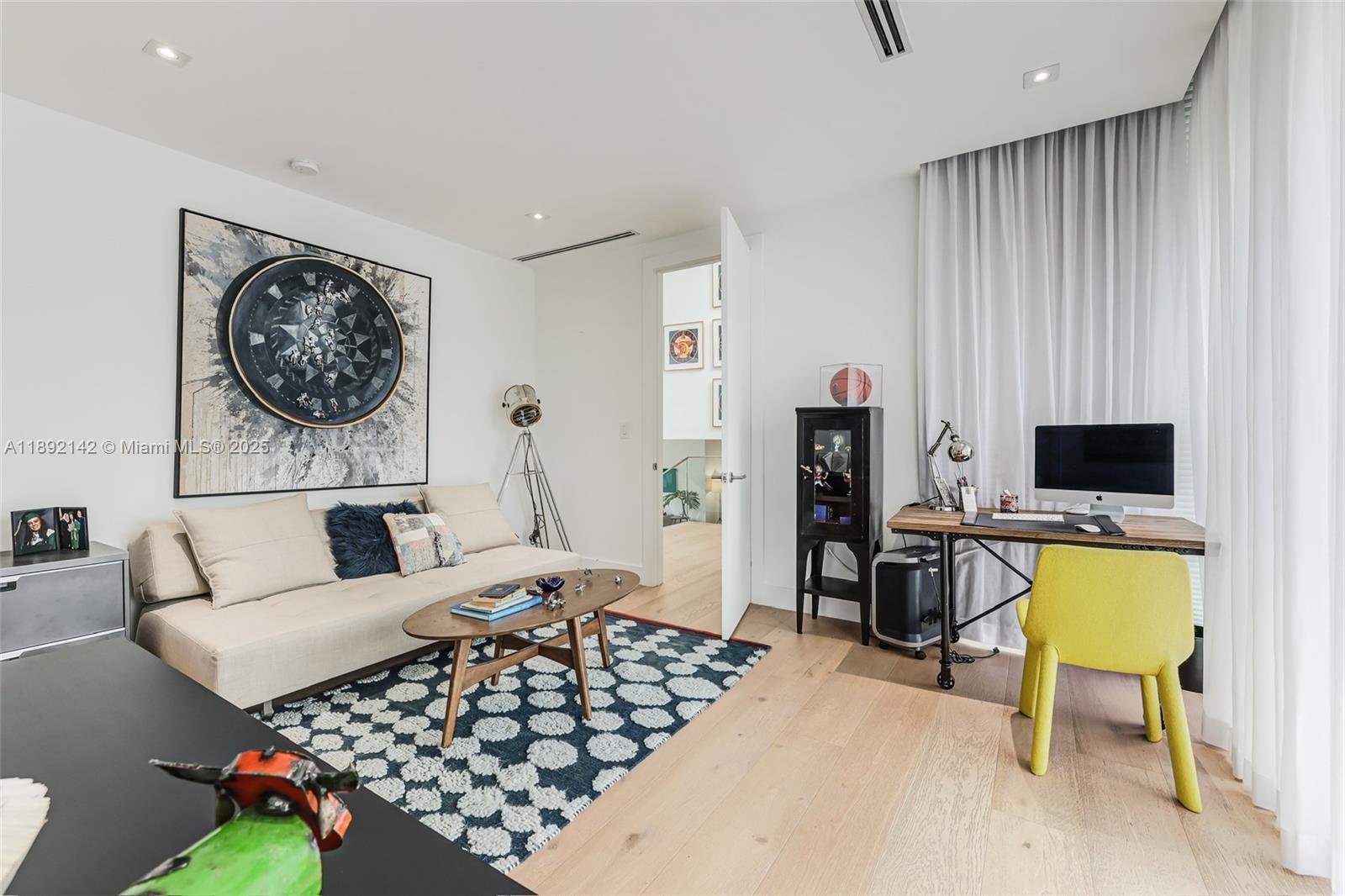 445 Ridgewood Road Key Biscayne, FL 33149 - Photo 17 of 35 a living room with furniture and a flat screen tv