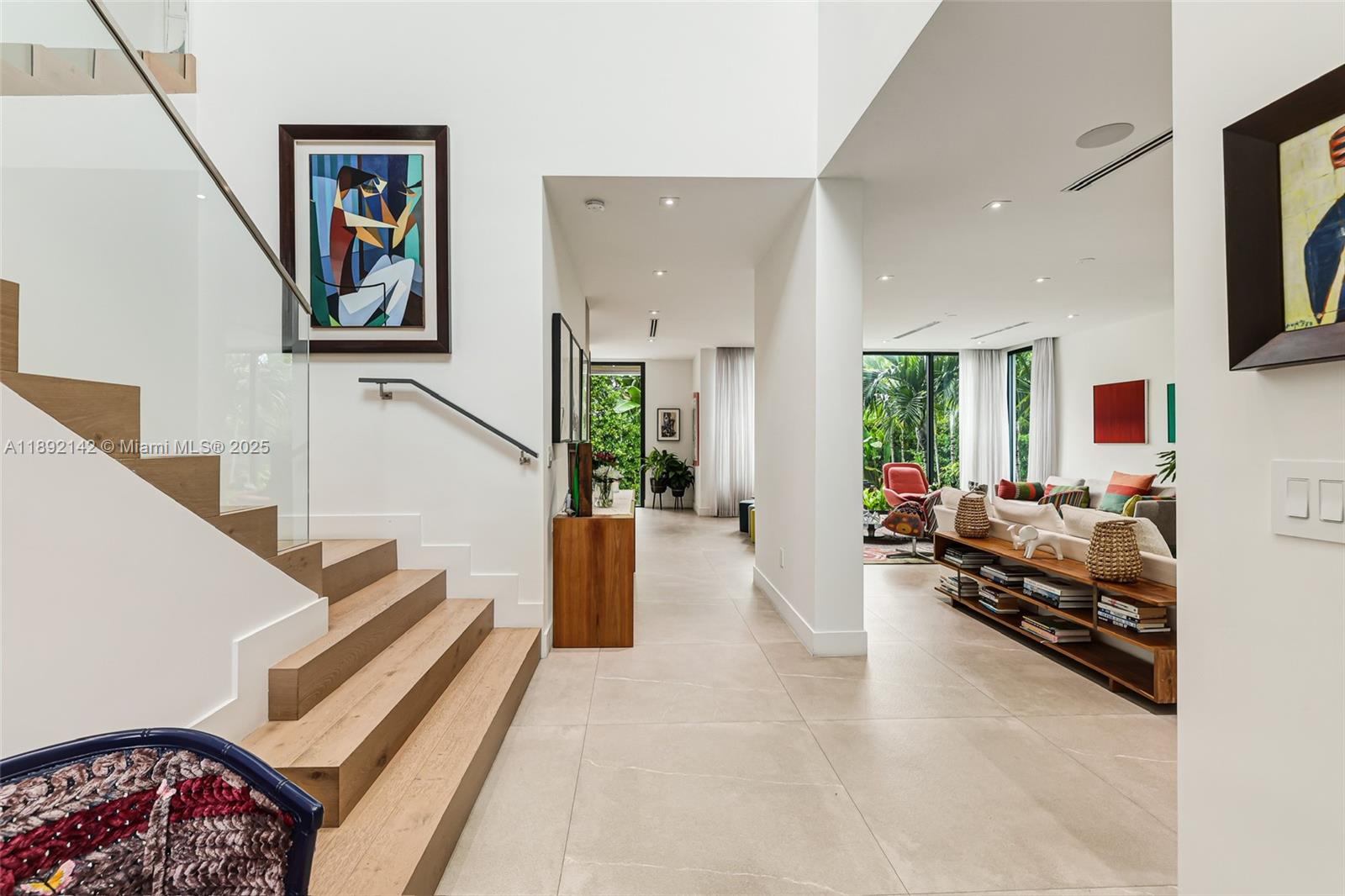 445 Ridgewood Road Key Biscayne, FL 33149 - Photo 2 of 35 a living room with furniture and a couch