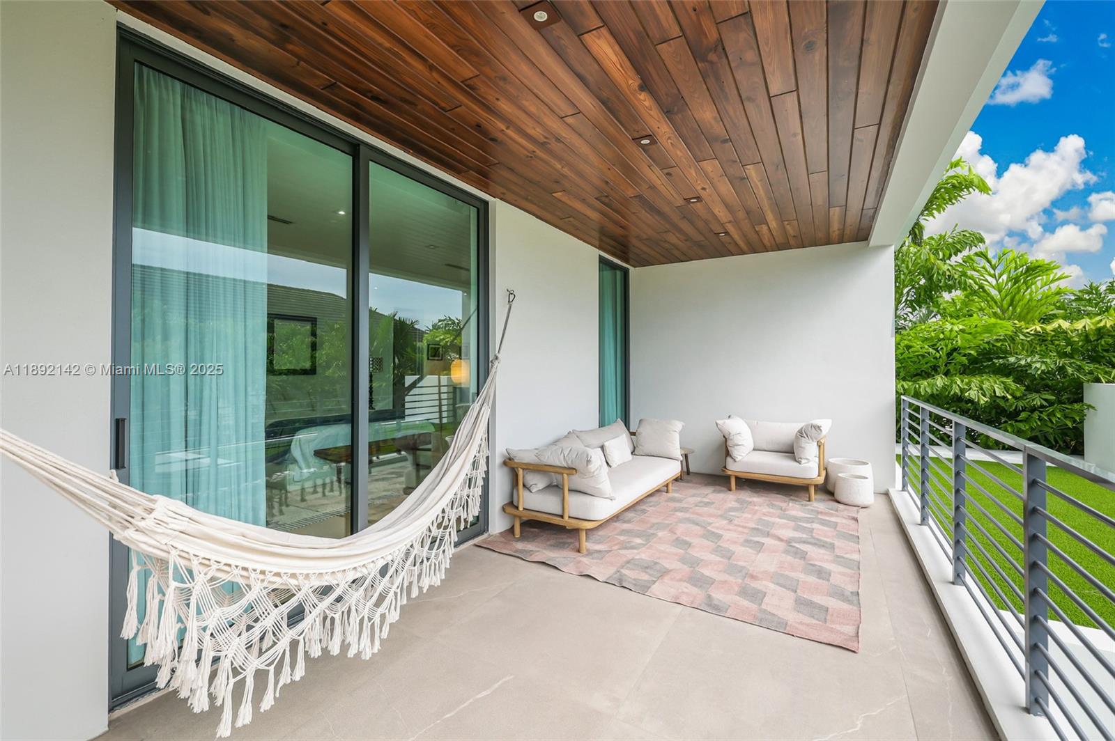 445 Ridgewood Road Key Biscayne, FL 33149 - Photo 28 of 35 a outdoor space with the couch